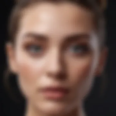 Close-up of a face with a compatible top-knot hairstyle