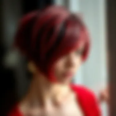 A close-up of a stylish haircut featuring a striking red hue