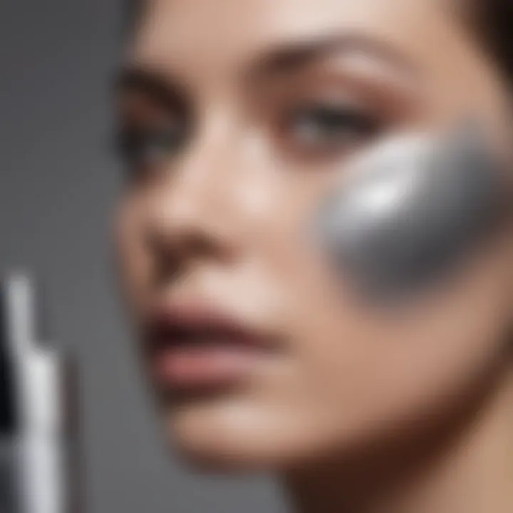 A close-up of cosmetics featuring silver gray shades and textures